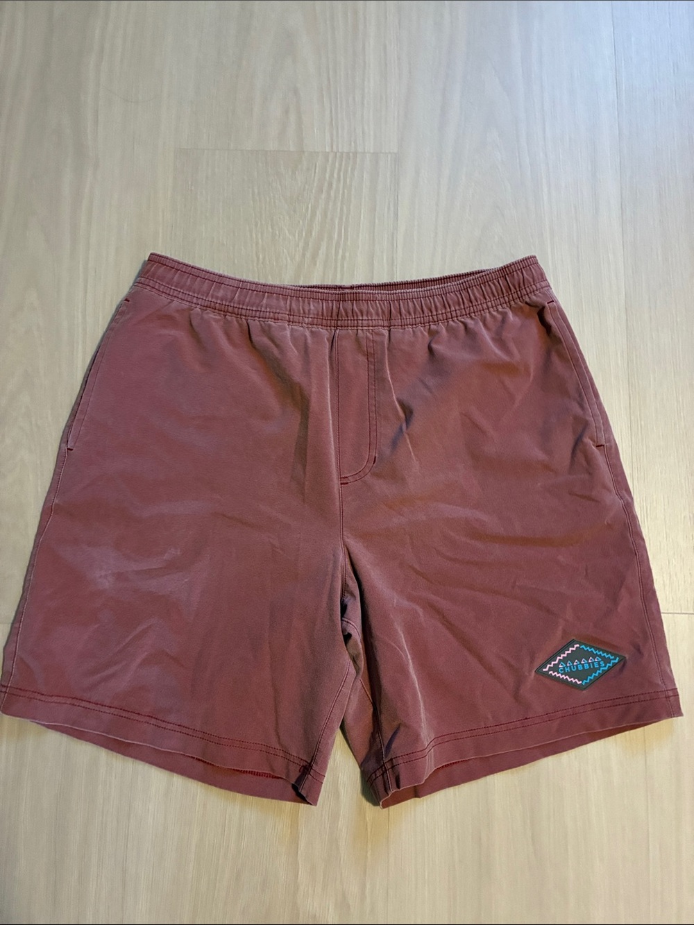 chubbies Rust Red Swim Lined Trunks with Patch Logo